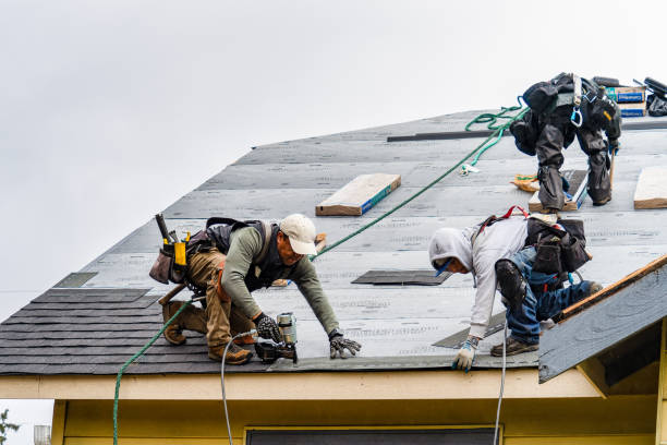 Professional Gutter Installation technician working in Abingdon, IL